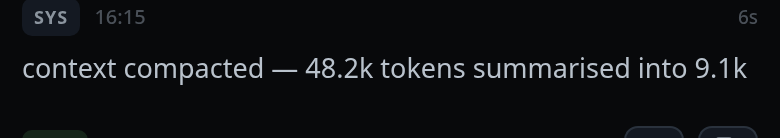 A system card in the transcript reading "context compacted — 48.2k tokens summarised into 9.1k", with its duration on the right.
