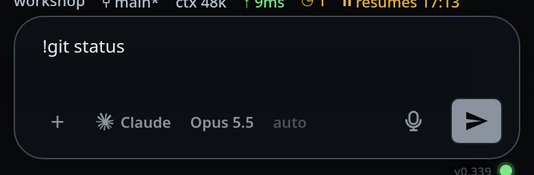 The composer with !git status typed in it and the send arrow lit.
