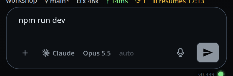The composer with "npm run dev" typed and the send arrow lit.